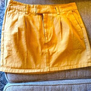 New, never worn Free People skirt.  Gold Rust color